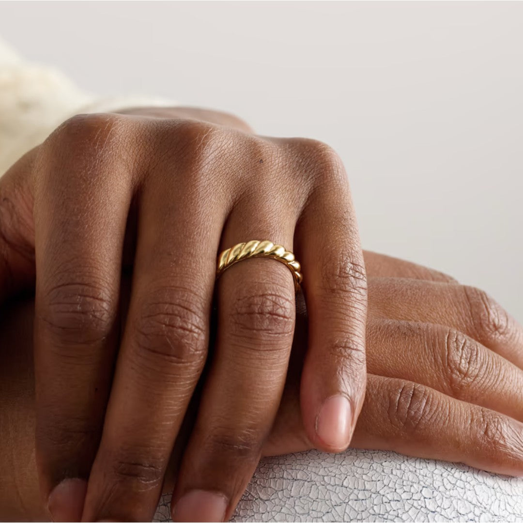 The 18-karat David Yurman 'Cable' ring is inspired by the brand's signature helix design.