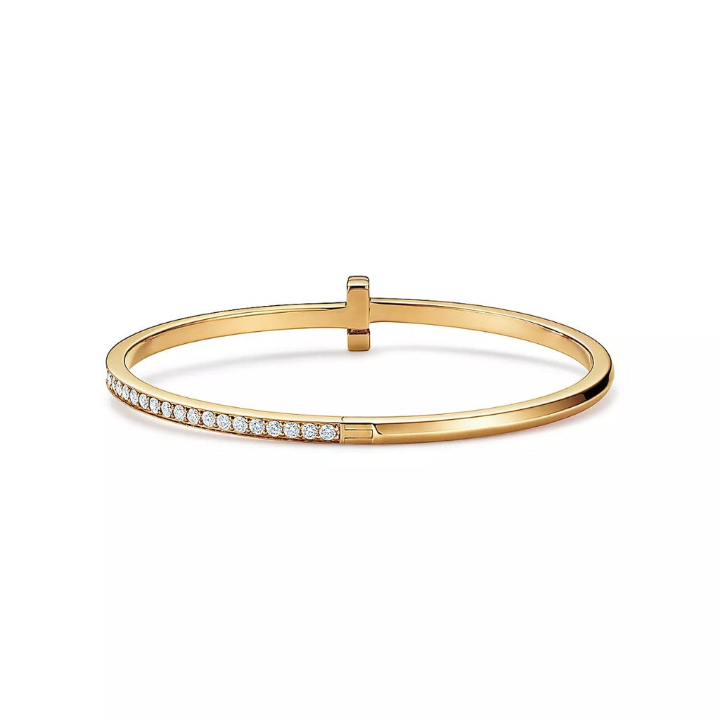 18k gold Tiffany & Co. with round brilliant diamonds T1 Narrow Diamond Hinged Bangle