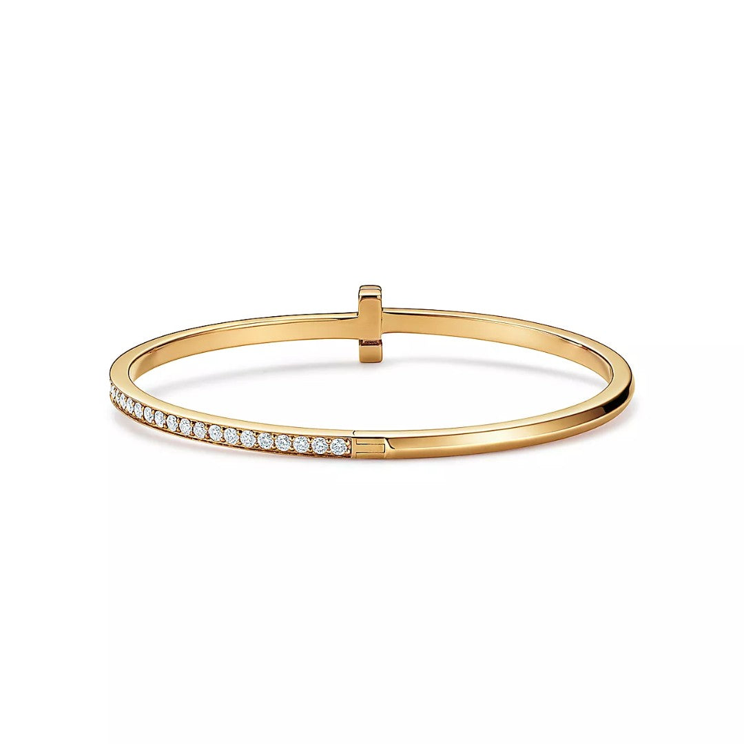 18k gold Tiffany & Co. with round brilliant diamonds T1 Narrow Diamond Hinged Bangle